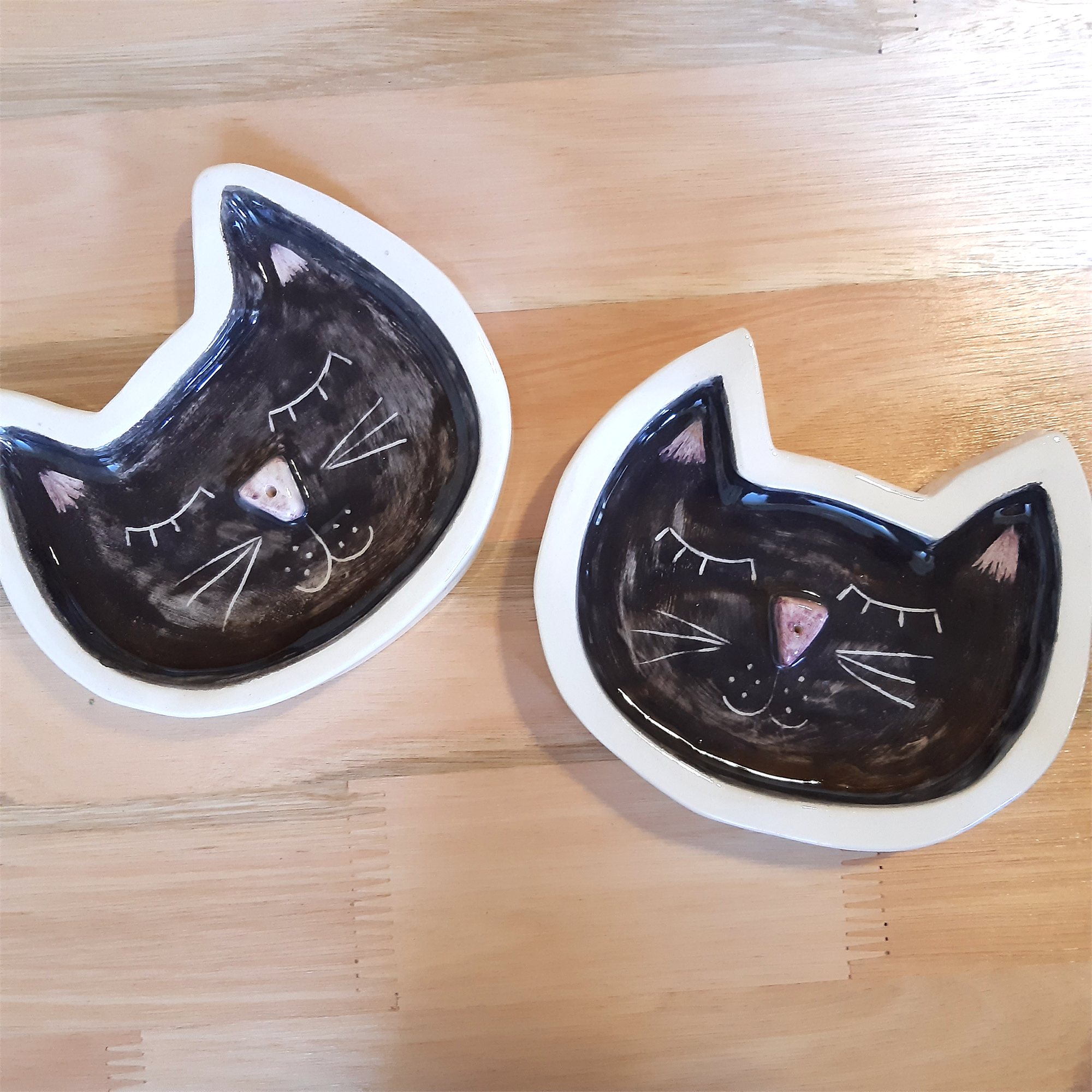 Portasahumerios o platito de gato