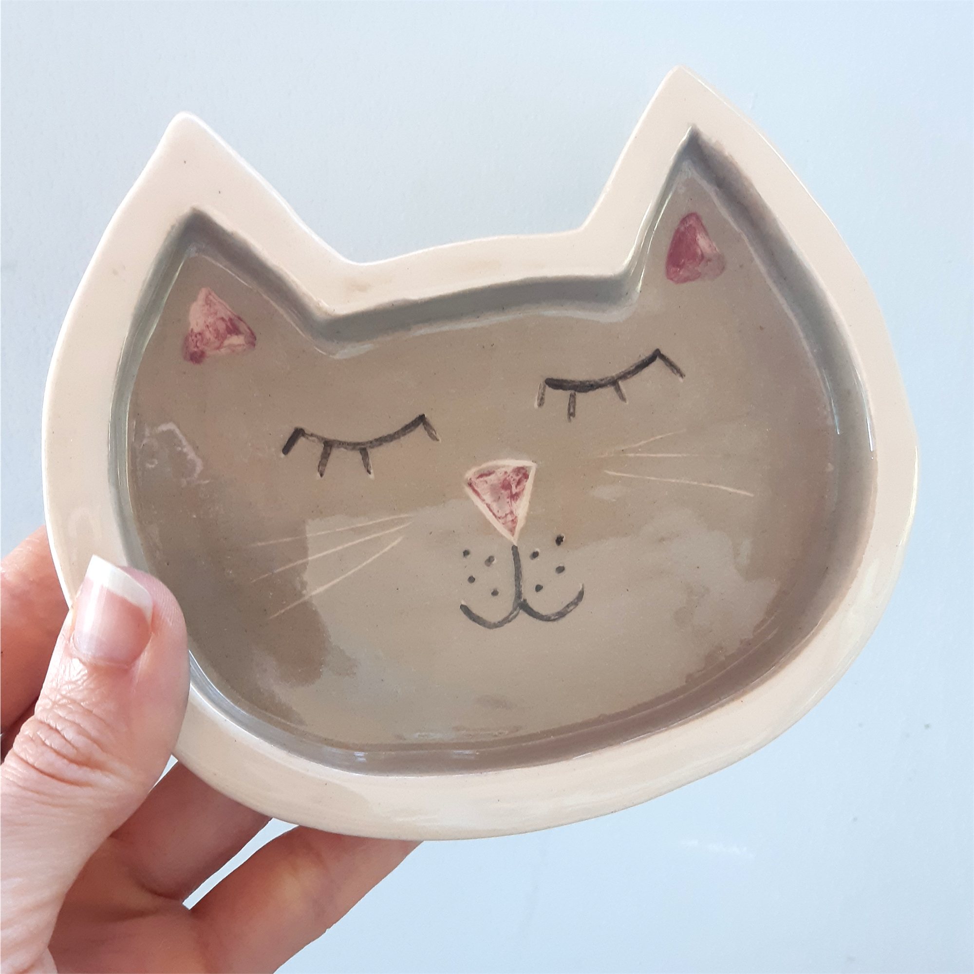 Portasahumerios o platito de gato